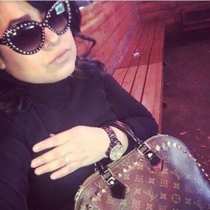 Authentic LouisVuitton Alma paintedblack w/studded